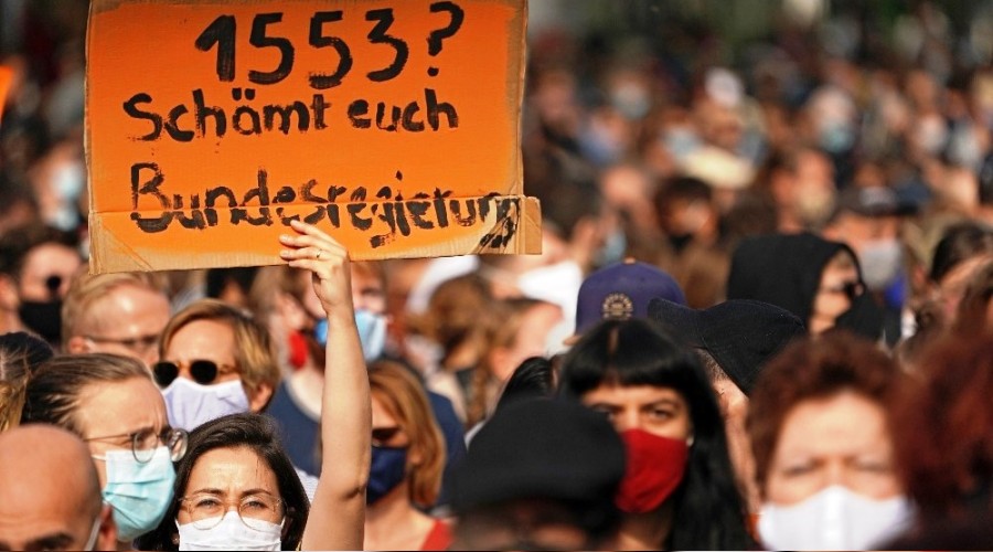 Berlin'de mülteciler için miting düzenlendi