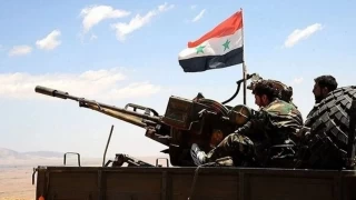 Hama'nın dış mahallelerine girmek isteyen silahlı gruplar ile Suriye ordusu arasında şiddetli çatışmalar yaşanıyor
