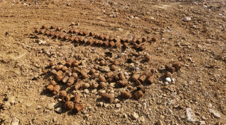 Toprağa gömülü bulunan yüzlerce bombanın sırrı çözülüyor