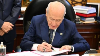 Bahçeli'den 'çerçeve yasa'ya imza