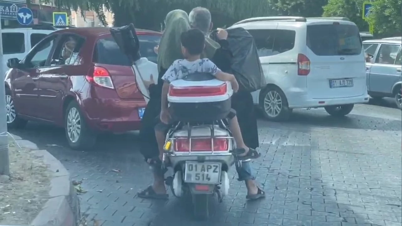 Motosikletle halı yıkama makinesi taşıdılar