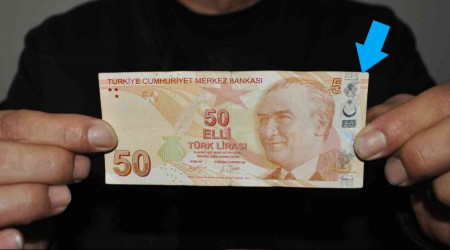 50 lirada sıfır olmadığını parasını sayarken fark etti