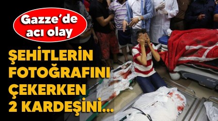 Şehitlerin fotoğrafını çekerken 2 kardeşini de aralarında gördü