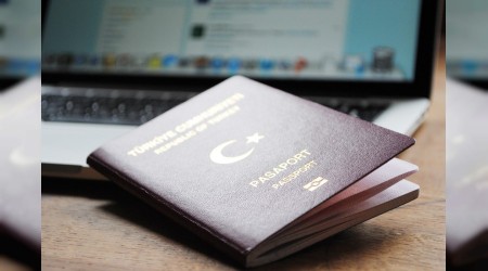 57 bin 191 kiinin pasaport yasa kalkt