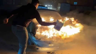 Alev alev yanan araca antifriz d�k�p s�nd�rmeye �al��t�