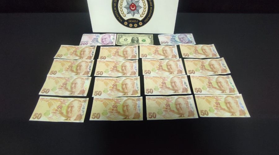 Bin liral�k sahte para ile yakaland�