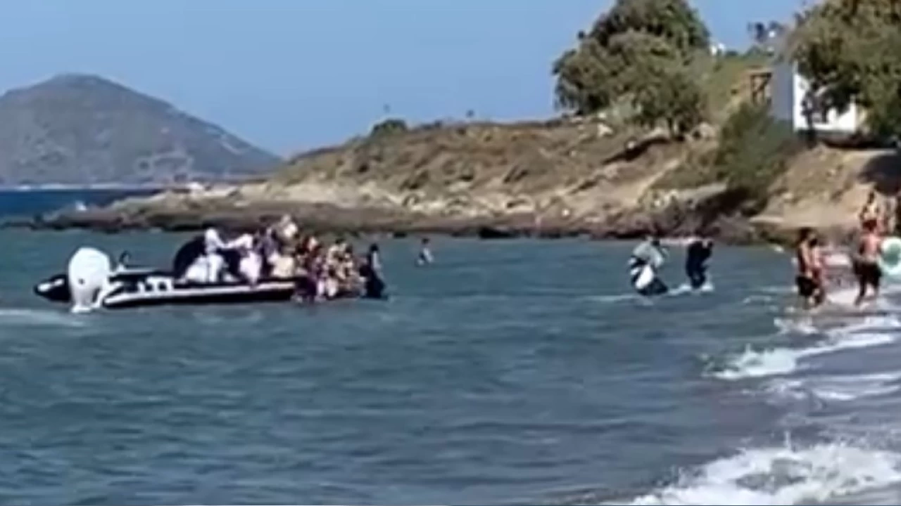 Turistlerin g�z� �n�nde m�ltecilerin ka���� herkesi �ok etti