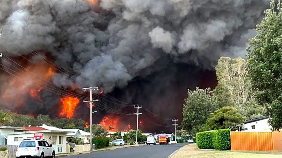 Avustralya hem yang�n hem de sel tehdidiyle kar�� kar��ya