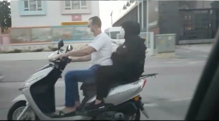 Bebekli iftin motosikletle tehlikeli yolculuu