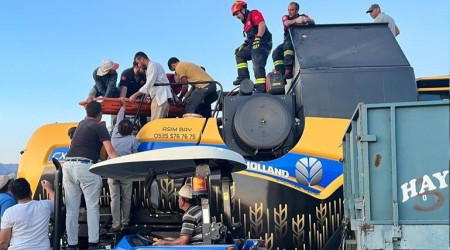 İki ayağını biçerdövere kaptırdı