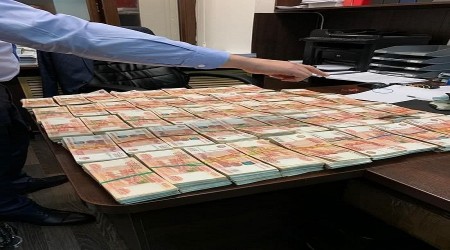 Rüşvet paralarını mezara gömmüş