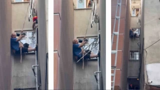İstanbul'da çatıdan düşen adam havada asılı kaldı
