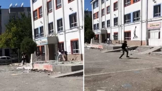 Okulun camlarn krdlar, bahesinde ate yaktlar