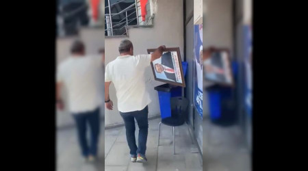 Tanju zcan'n fotorafn pe attlar