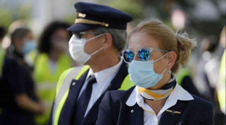 Almanya'da uçakta maske zorunluluğu kalktı