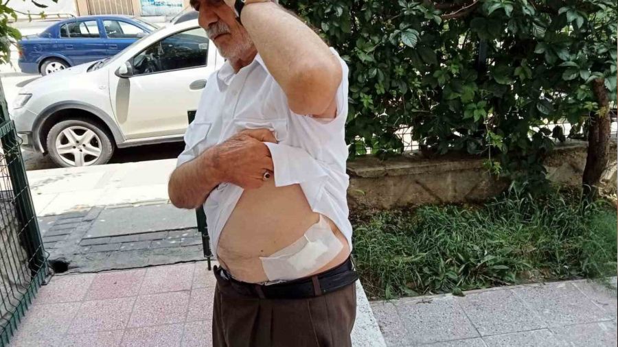 Kart�n� vermeye gelen kom�usunu b��akla yaralad�