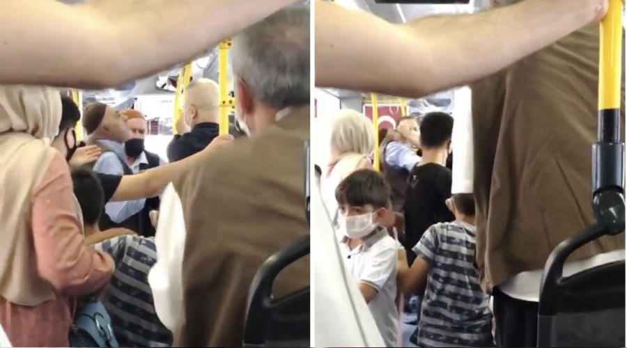 Maskesini yarım takan yaşlı adama kadın tokat attı