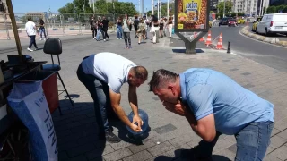 Taksim'de damacana ile serinlemeye altlar