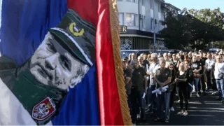 BM, sava� su�lusu Mladic'in cenaze t�reninde "y�celtilmesine" tepki g�sterdi