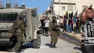 Filistin topraklar�n� gasbeden �srailliler, ordunun korumas�nda Nablus'taki Tel beldesine bask�n d�zenledi