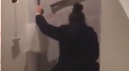 Komularnn duvarlarna tehdit szleri yazp dk sren kadn snr d edildi