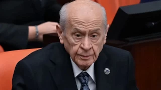 Devlet Baheli ve 2000 Ulusal Program: Kbrsta iki devletli zmden geri admn siyasal sorumluluu