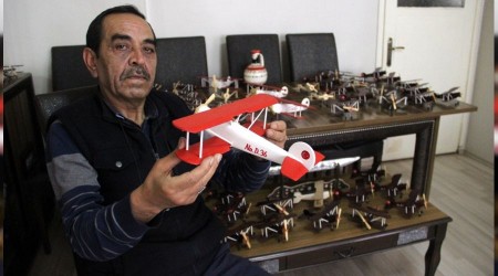 Eve kapandı, yüzlerce uçak yaptı