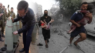 İsrail Cumhurbaşkanı, Gazze'ye atılacak obüs mermisinin üzerine "size güveniyoruz" yazdı