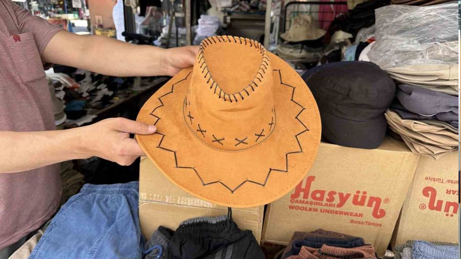 Artan hava s�cakl��� �apka sat��lar�n� artt�rd�