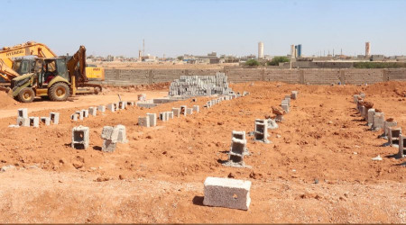Sel kurbanları toplu mezarlara defnediliyor